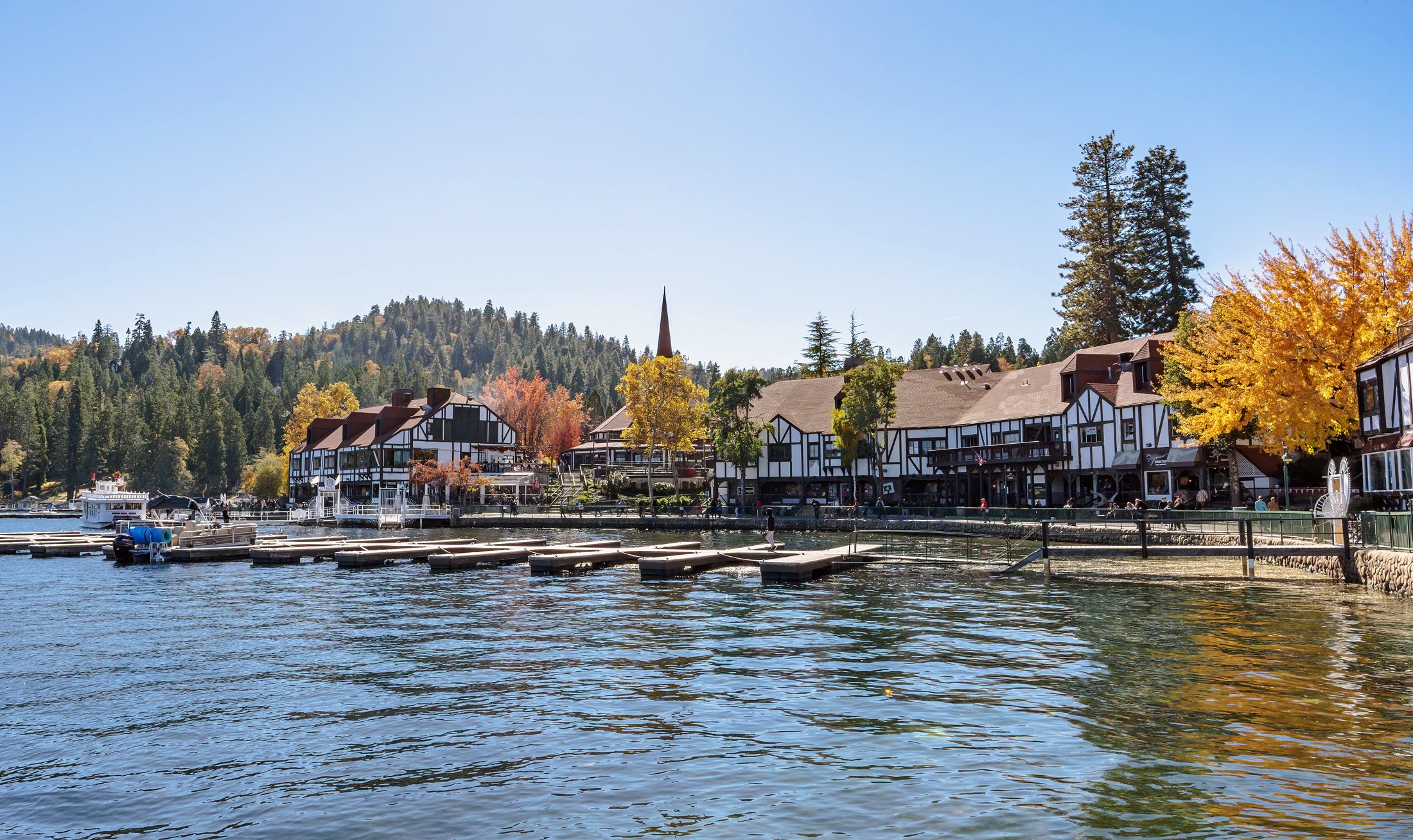 lake front with shops and boat dock