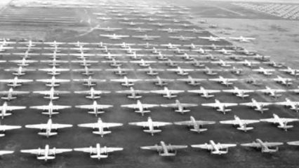 WWII planes in a field.