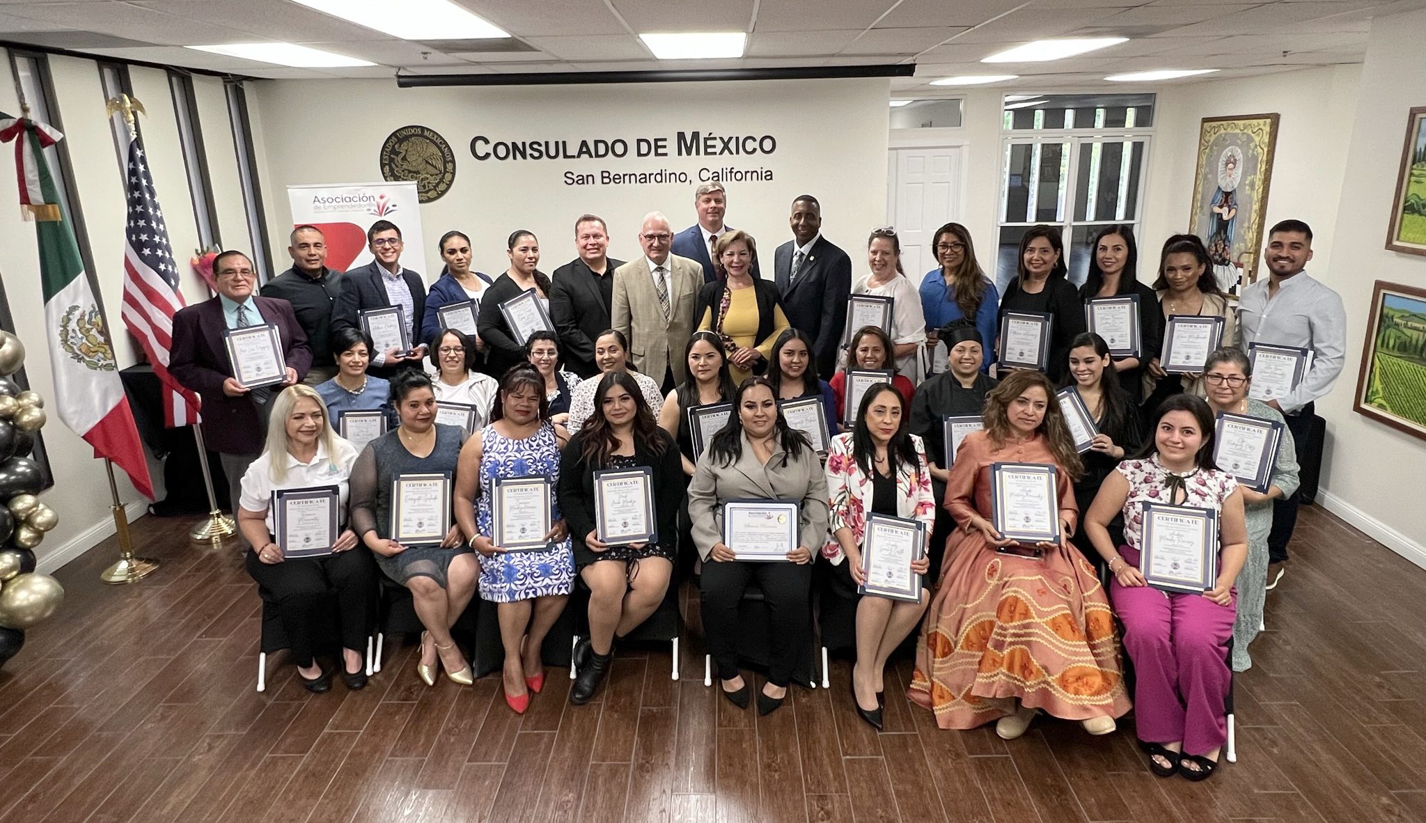 Local entrepreneurs graduate from Emprendedor@s Program in December 2023.