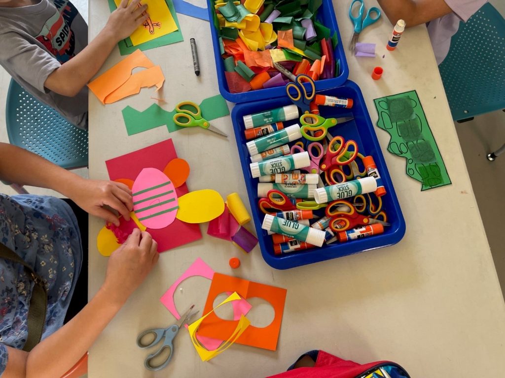 kids crafting at a table