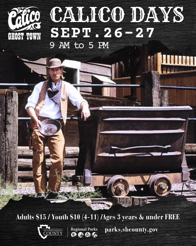 A man dressed as an Old West miner standing beside an ore cart at Calico Ghost Town. Text: Calico Days, Sept. 26–27 from 9 a.m. to 5 p.m. Admission is $15 for adults, $10 for youth ages 4–11 and free for children ages 3 and under. Website URL, parks.sbcounty.gov.