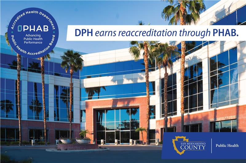 Exterior of County Public Health building with overlay text announcing PHAB reaccreditation and county logo.