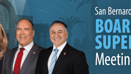 San Bernardino County Board of Supervisors Meeting Actions banner with the county shield emblem, displaying five supervisors in professional suits, smiling in front of a backdrop featuring the San Bernardino County Government Center building with palm trees.