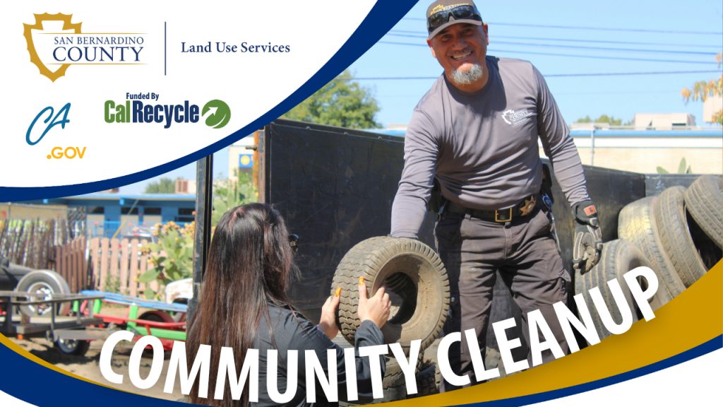 County staff load used tires onto a truck as part of a community cleanup event. Logos of the organizations coordinating the event are shown, including San Bernardino County Land Use Services.
