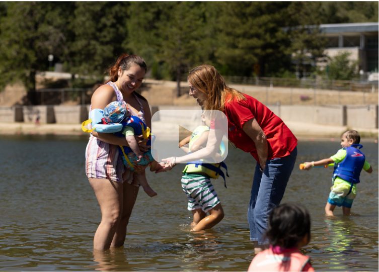 Families enjoy First 5 San Bernardino event near Lake Gregory Regional Park.