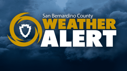 A graphic from San Bernardino County with text that says, “Weather Alert” and a website link Prepare.SBCounty.gov with a stormy cloud background.