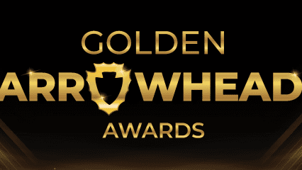 Gold “Golden Arrowhead Awards” text with arrowhead replacing the “o” in “Arrowhead” and light beams in background.