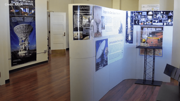An exhibit featuring informational displays about space exploration at the Goldstone Deep Space Communications Complex. 