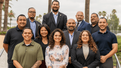 Team members from San Bernardino County Human Resources divisions who contributed to the 2026 NACo award-winning projects pose together outdoors.