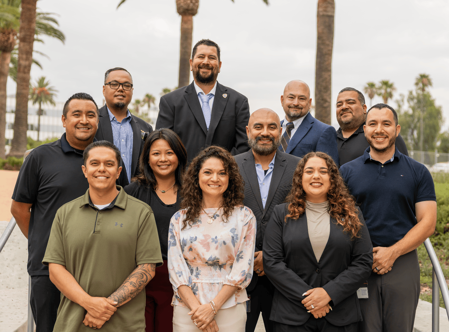 Team members from San Bernardino County Human Resources divisions who contributed to the 2026 NACo award-winning projects pose together outdoors.