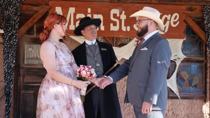 A couple getting married on the Main Street Stage in Calico Ghost Town on Oct. 31, 2024.
