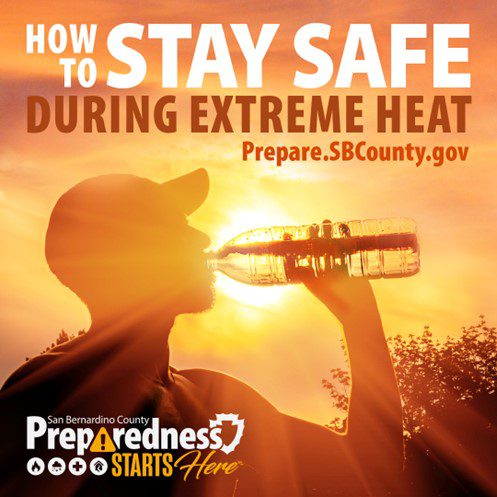Person drinks water from a bottle under the sun with text: “How to stay safe during extreme heat. Prepare.SBCounty.gov.” “Preparedness” logo present.
