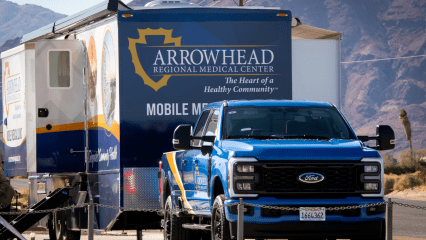 A Ford truck towing Arrowhead Regional Medical Center’s Mobile Medical Clinic unit, which provides health care services to communities and remote areas in San Bernardino County.