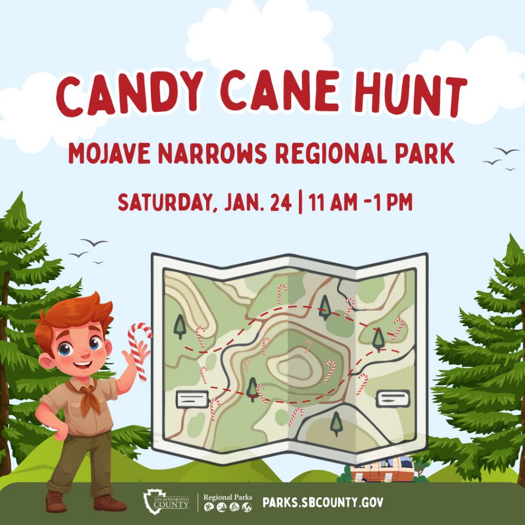 An illustration of a boy dressed in a park ranger outfit holding a candy cane with a map with little candy canes throughout with a park setting with green hills and tress and a small camper against blue sky and puffy white clouds and Candy Cane Hunt, Mojave Narrows Regional Park and Saturday, Jan. 24, 11 a.m. to 1 p.m. lettering at the top.