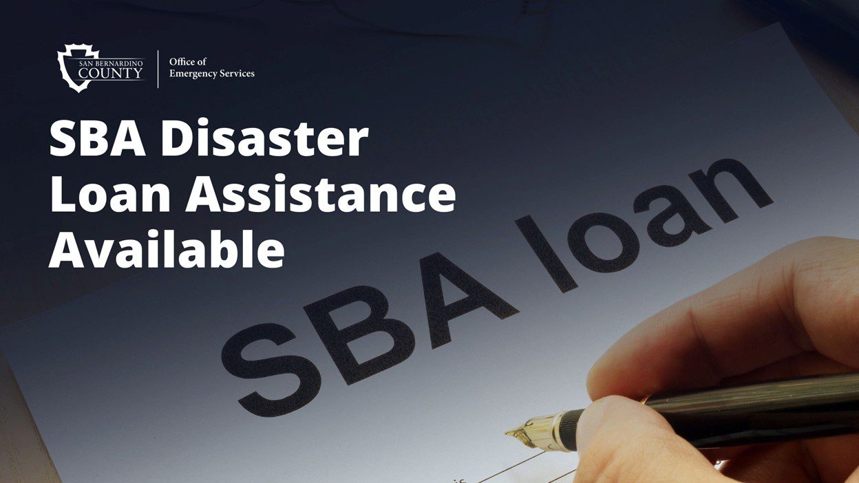 A person's hand holding a pen over paper with "SBA loan" text, alongside a notice: "SBA Disaster Loan Assistance Available" from San Bernardino County Office of Emergency Services.