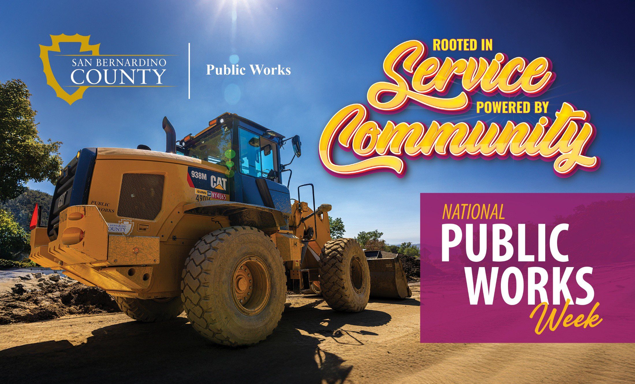 Public Works loader under bright blue sky with “Rooted in Service, Powered by Community” National Public Works Week text.