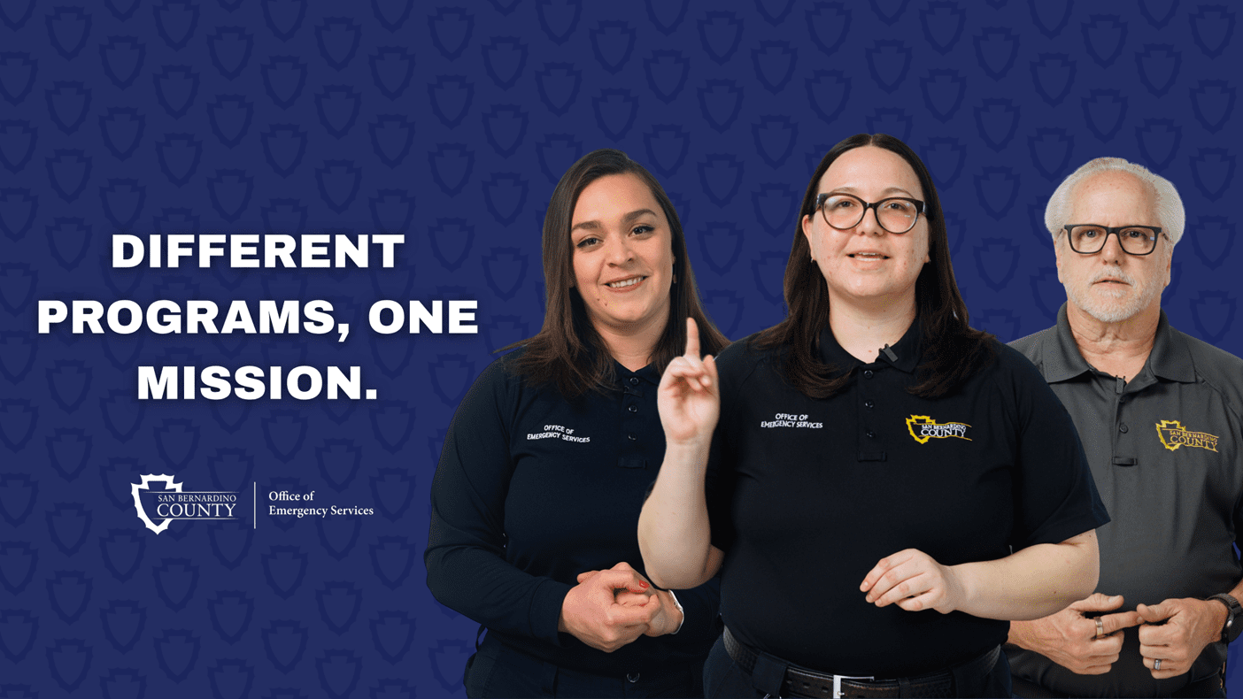 Three Office of Emergency Services team members stand together with the message: “Different Programs, One Mission.”