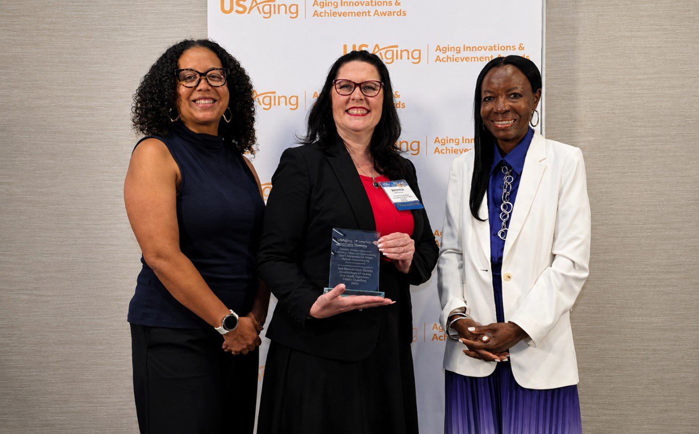 DAAS-Public Guardian staff pose with a USAging Aging Innovations Award at the 2026 conference.