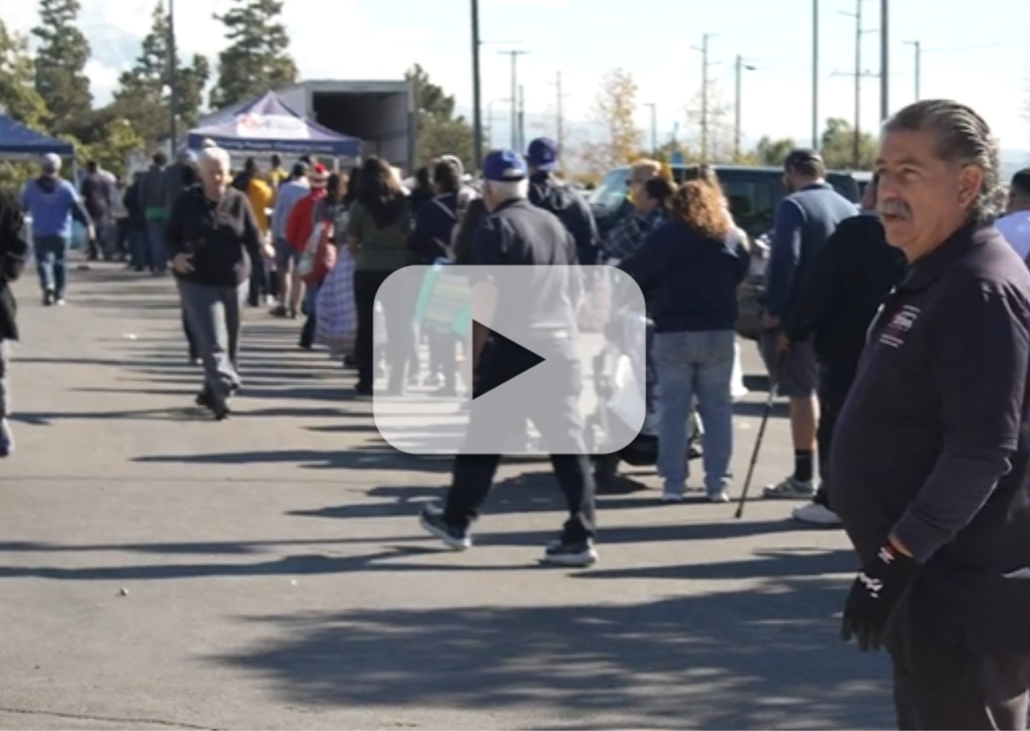 People stand in a long line.