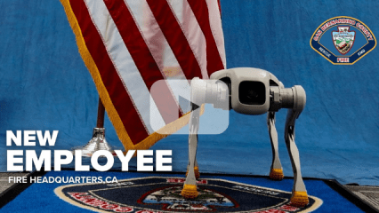 Robot dog by a U.S. flag and San Bernardino County Fire Protection District logo. Text “New Employee, Fire Headquarters, CA,” and video play button.