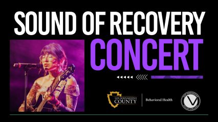 A performer singing into a microphone while playing guitar, with a purple spotlight behind them. Large bold text reads “Sound of Recovery Concert.”