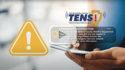 A “play” button overlaid on an image of a person receiving a TENS notification.