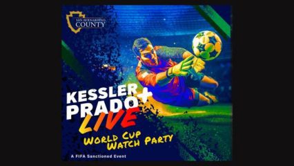 A male soccer goalie dives to catch a soccer ball in mid-air with text that says Live World Cup Watch Party, A FIFA Sanctioned Event and the county logo.
