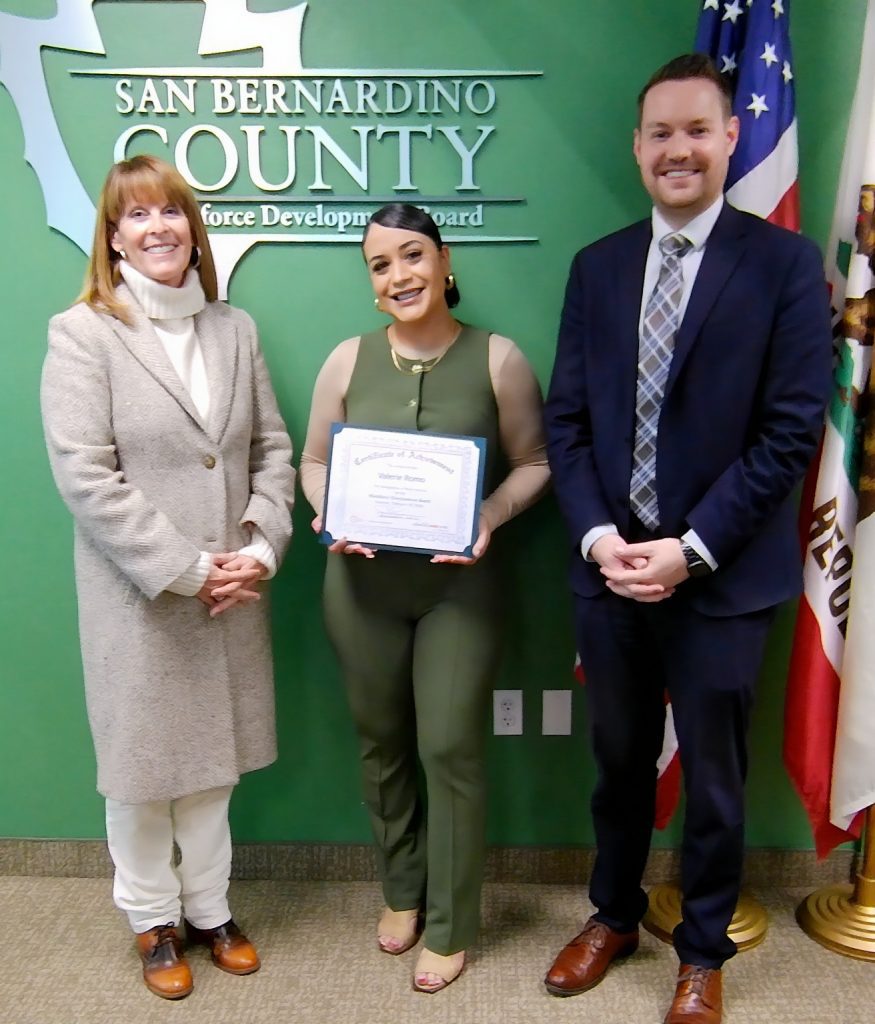 (From left to right) Shannon Shannon, San Bernardino County Workforce Development Board Chair; Valerie Romo; and Bradley Gates, director of Workforce Development.