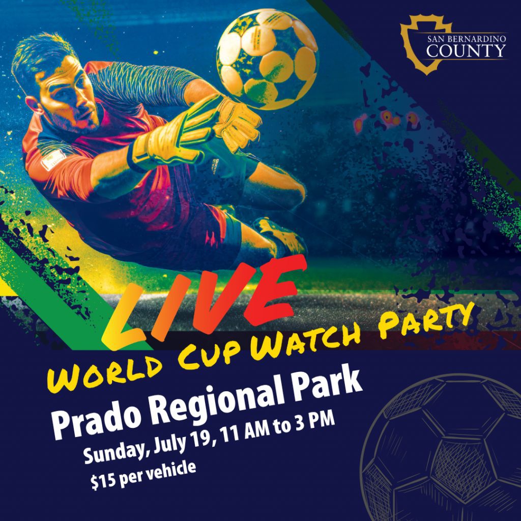 A goalkeeper in action during a soccer game is the main focus. The text reads: "LIVE World Cup Watch Party at Prado Regional Park, Sunday, July 19, 11 AM to 3 PM, $15 per vehicle." A San Bernardino County logo is in the top corner.