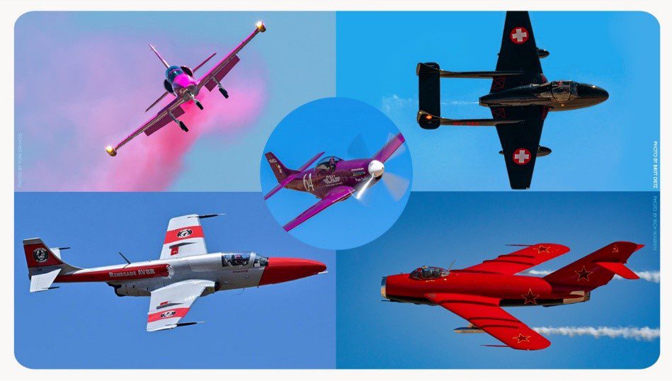 Five vintage airplanes taking flight in the sky. The top left plane is surrounded with pink smoke.