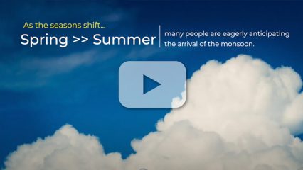 A background with blue sky and white clouds. As the seasons shift from Spring to Summer many people are eagerly anticipating the arrival of the monsoon.