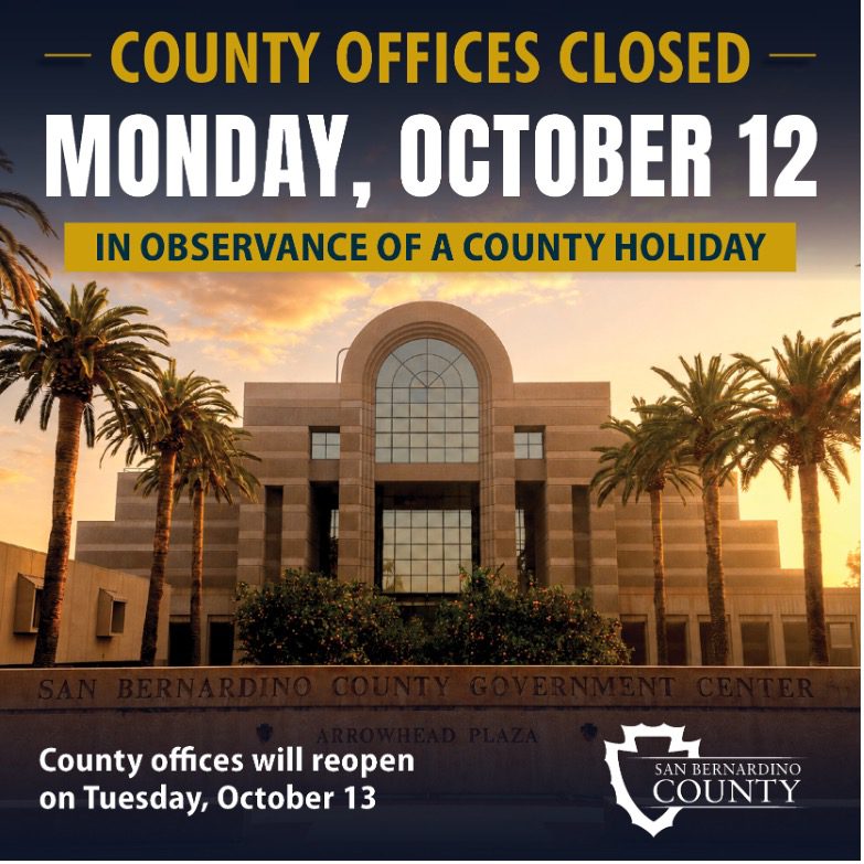 Government Center. Text: "County Offices Closed Mon, Oct. 12 in observance of a county holiday." Offices will reopen Tues, Oct. 13. County logo.