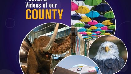 Collage featuring colorful umbrellas, a woolly mammoth display, a close-up of an eagle and a vintage aircraft. Text reads: "Share Photos & Videos of our County - Destinations • Nature • Cityscapes.